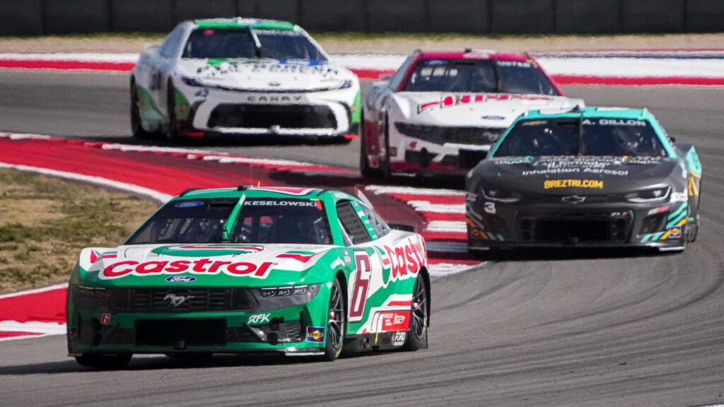 Castrol Ford driver Brad Keselowski (6) leads a group of cars through turn 17 during the NASCAR Cup Series EchoPark Automotive Grand Prix at Circuit of the Americas on Sunday, March 2, 2025 in Austin.