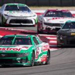 Castrol Ford driver Brad Keselowski (6) leads a group of cars through turn 17 during the NASCAR Cup Series EchoPark Automotive Grand Prix at Circuit of the Americas on Sunday, March 2, 2025 in Austin.
