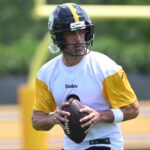 Pittsburgh Steelers quarterback Aaron Rodgers (8) drops back to pass during minicamp at their South Side facility.
