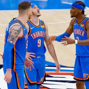 Jun 8, 2025; Oklahoma City, Oklahoma, USA; Oklahoma City Thunder center Isaiah Hartenstein (55) and guard Alex Caruso (9) and guard Shai Gilgeous-Alexander (2) talk during the third quarter against the Indiana Pacers in game two of the 2025 NBA Finals at Paycom Center.