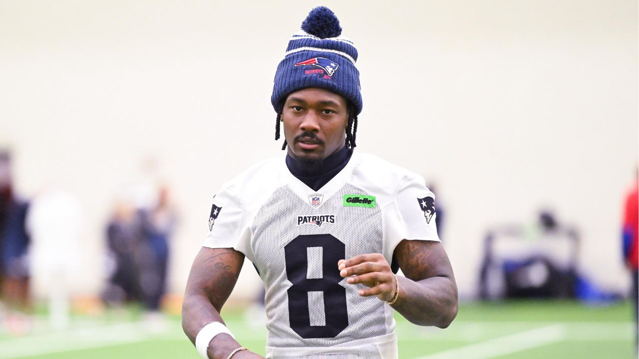 New England Patriots wide receiver Stefon Diggs (8) walks to the podium to speak to the media after minicamp held in the WIN Field House at Gillette Stadium.