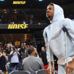 Memphis Grizzlies guard Ja Morant (12) looks on during a time out during the fourth quarter against the Oklahoma City Thunder during game four for the first round of the 2024 NBA Playoffs at FedExForum.