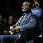 Former Memphis Grizzles Zach Randolph sits on stage during his jersey retirement ceremony
