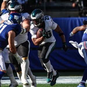 Philadelphia Eagles running back Saquon Barkley (26) carries the ball during the second half against the New York Giants at MetLife Stadium.