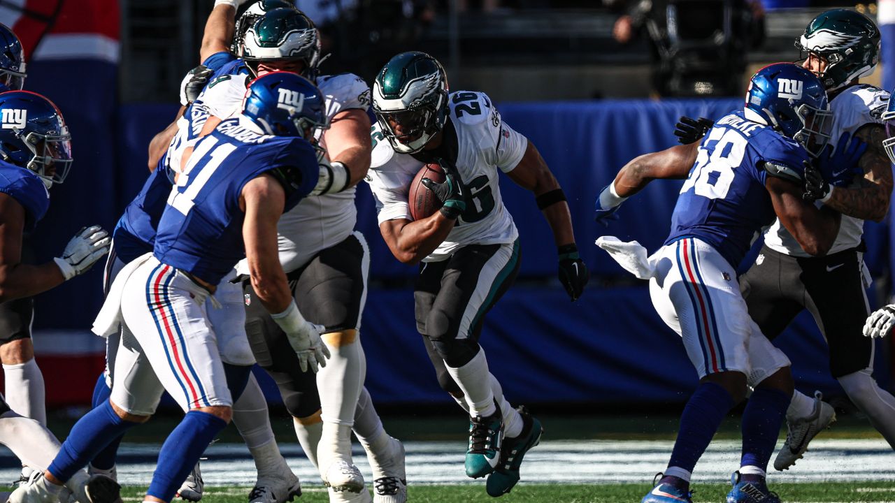 Philadelphia Eagles running back Saquon Barkley (26) carries the ball during the second half against the New York Giants at MetLife Stadium.
