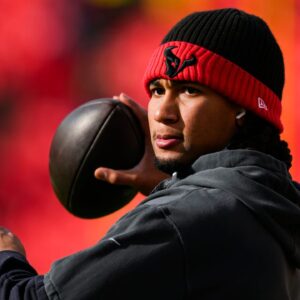 Houston Texans quarterback C.J. Stroud (7) warms up prior to a 2025 AFC divisional round game against the Kansas City Chiefs at GEHA Field at Arrowhead Stadium.