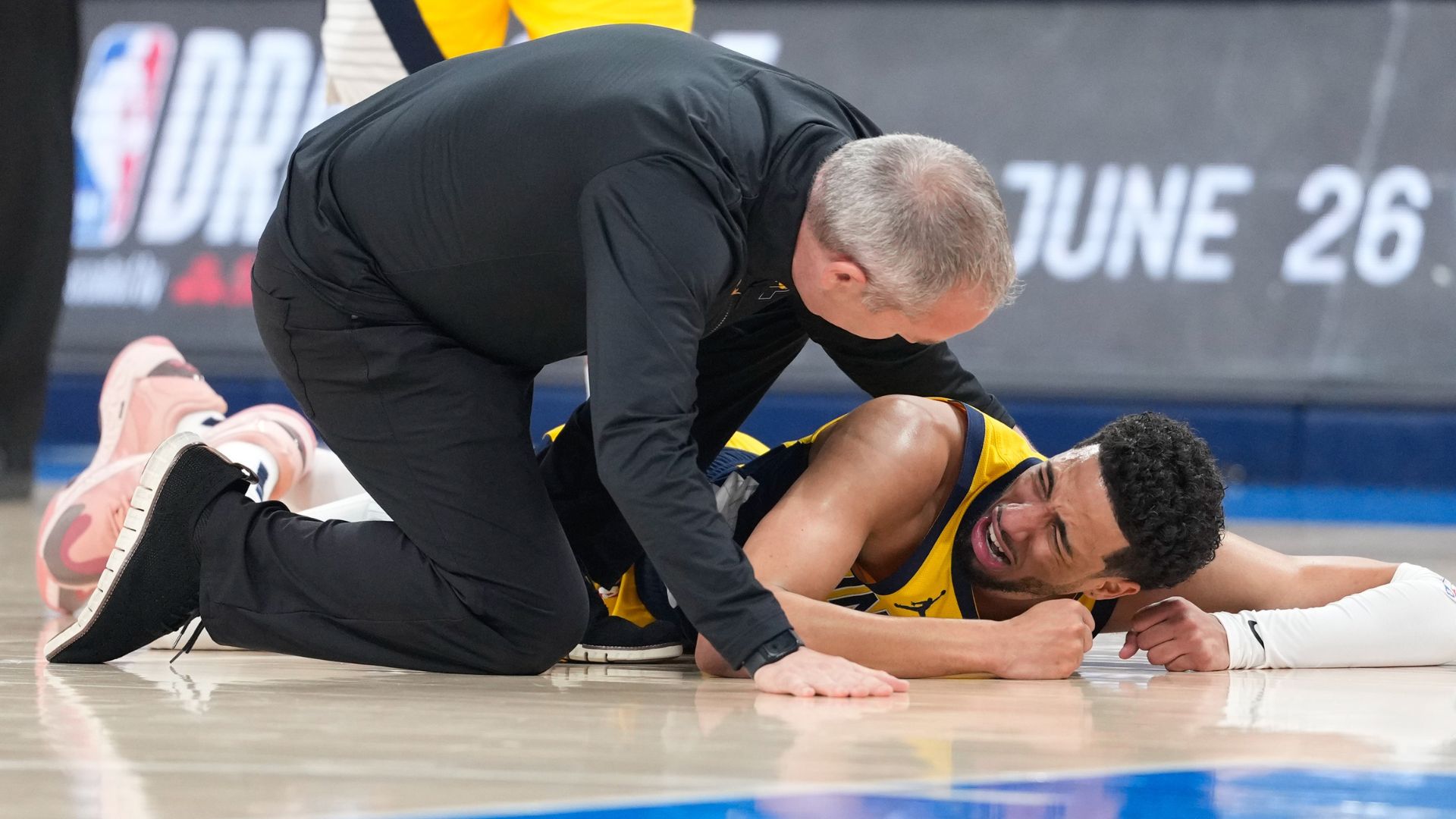 Jun 22, 2025; Oklahoma City, Oklahoma, USA; Indiana Pacers guard Tyrese Haliburton (0) reacts after suffering an injury during the first quarter against the Oklahoma City Thunder during game seven of the 2025 NBA Finals at Paycom Center.
