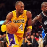 March 14, 2011; Los Angeles, CA, USA; Los Angeles Lakers shooting guard Kobe Bryant (24) moves the ball against the defense of Orlando Magic shooting guard Jason Richardson (23) during the second half at the Staples Center. Mandatory Credit: Gary A. Vasquez-Imagn Images