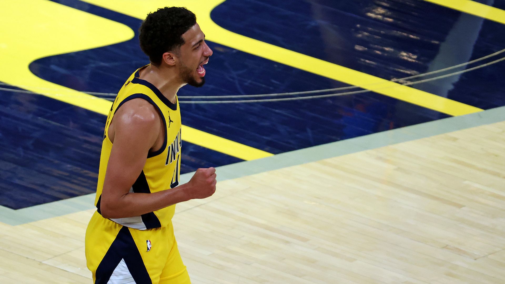 Jun 11, 2025; Indianapolis, Indiana, USA; Indiana Pacers guard Tyrese Haliburton (0) celebrates after beating the Oklahoma City Thunder in game three of the 2025 NBA Finals at Gainbridge Fieldhouse.