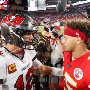 Tampa Bay Buccaneers quarterback Tom Brady (12) greets Kansas City Chiefs quarterback Patrick Mahomes (15) after a game at Raymond James Stadium.