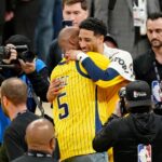 Reggie Miller hugs Indiana Pacers guard Tyrese Haliburton (0) after winning game six of the 2025 NBA Finals between the Oklahoma City Thunder and the Indiana Pacers at Gainbridge Fieldhouse.