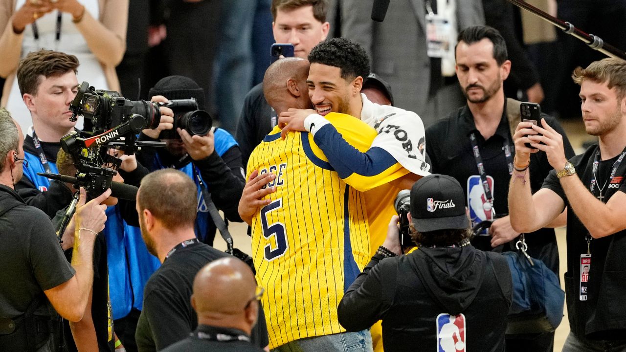 Reggie Miller hugs Indiana Pacers guard Tyrese Haliburton (0) after winning game six of the 2025 NBA Finals between the Oklahoma City Thunder and the Indiana Pacers at Gainbridge Fieldhouse.