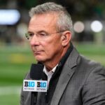 Former Ohio State Buckeyes head coach Urban Meyer broadcasts for the Big Ten Network prior to the College Football Playoff National Championship against the Notre Dame Fighting Irish at Mercedes-Benz Stadium in Atlanta on Jan. 20, 2025.