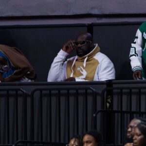 Former NBA player Shaquille O'Neal sits courtside during the first half between the Florida Gators and the LSU Tigers at Exactech Arena at the Stephen C. O'Connell Center