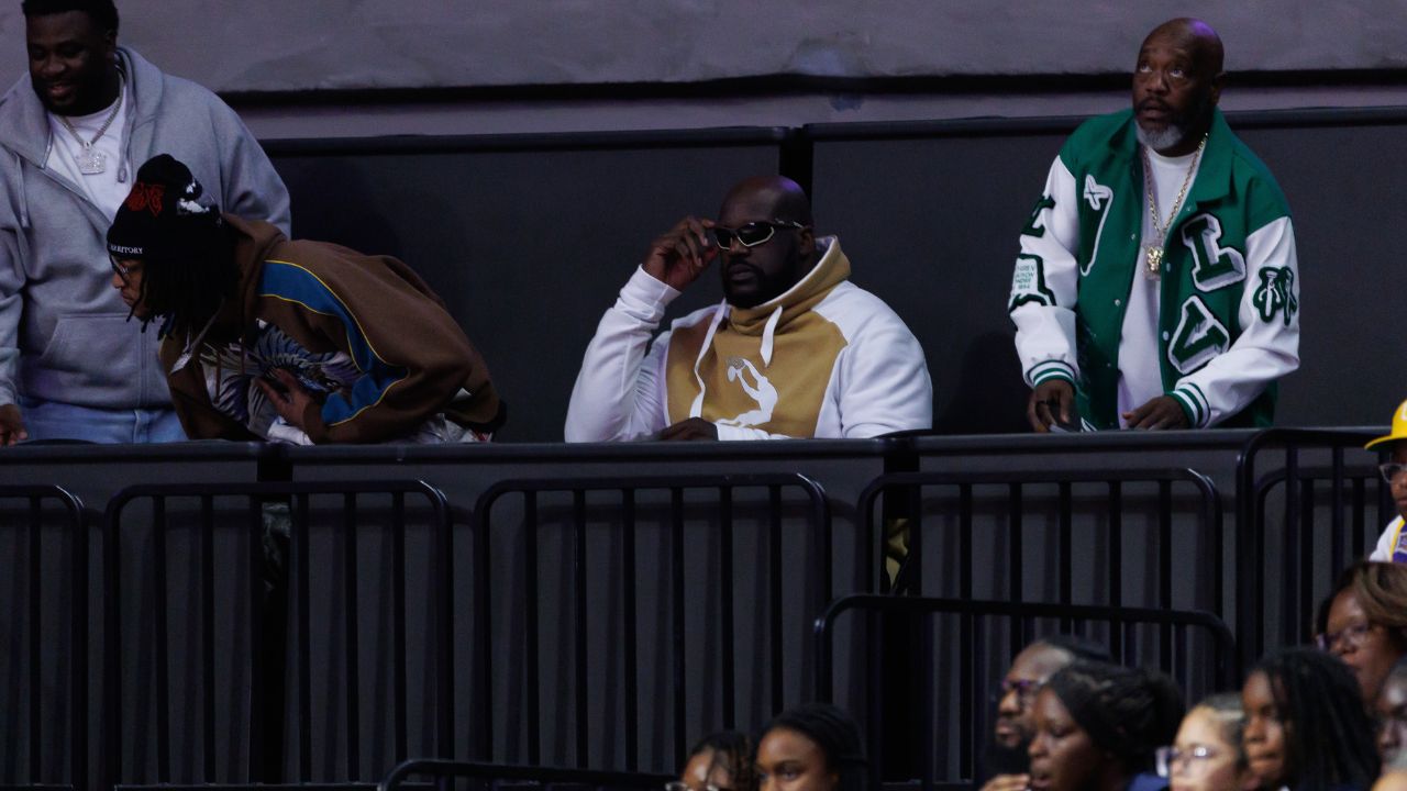 Former NBA player Shaquille O'Neal sits courtside during the first half between the Florida Gators and the LSU Tigers at Exactech Arena at the Stephen C. O'Connell Center