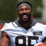 Browns defensive end Myles Garrett has a moment with defensive line coach Jacques Cesaire during practice at minicamp, Tuesday, June 10, 2025, in Berea.
