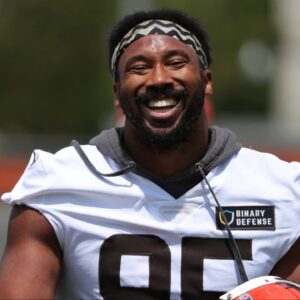 Browns defensive end Myles Garrett has a moment with defensive line coach Jacques Cesaire during practice at minicamp, Tuesday, June 10, 2025, in Berea.
