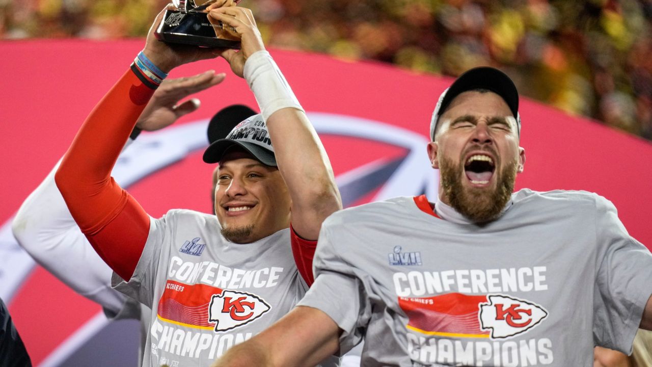 Jan. 29, 2023: Patrick Mahomes raises the Lamar Hunt Trophy while Travis Kelce celebrates after the Kansas City Chiefs' 23-20 win over the Cincinnati Bengals in the AFC championship game at Arrowhead Stadium.