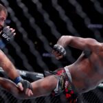 Jon Jones (red gloves) fights Stipe Miocic (blue gloves) in the heavyweight bout during UFC 309 at Madison Square Garden.