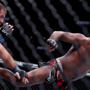 Jon Jones (red gloves) fights Stipe Miocic (blue gloves) in the heavyweight bout during UFC 309 at Madison Square Garden.
