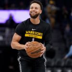 Jan 10, 2023; San Francisco, California, USA; Golden State Warriors guard Stephen Curry (30) smiles during warmups against the Phoenix Suns at the Chase Center.