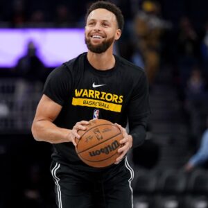 Jan 10, 2023; San Francisco, California, USA; Golden State Warriors guard Stephen Curry (30) smiles during warmups against the Phoenix Suns at the Chase Center.