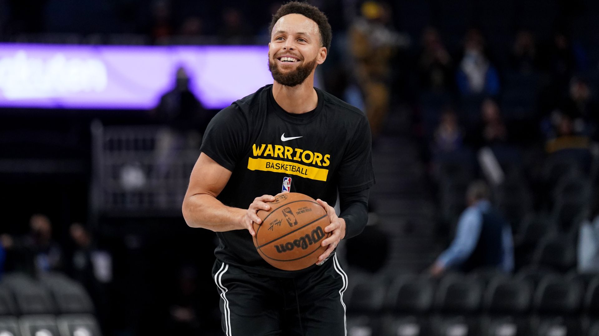 Jan 10, 2023; San Francisco, California, USA; Golden State Warriors guard Stephen Curry (30) smiles during warmups against the Phoenix Suns at the Chase Center.