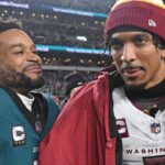 Philadelphia Eagles cornerback Darius Slay Jr. (2) and Washington Commanders quarterback Jayden Daniels (5) after the NFC Championship game at Lincoln Financial Field.