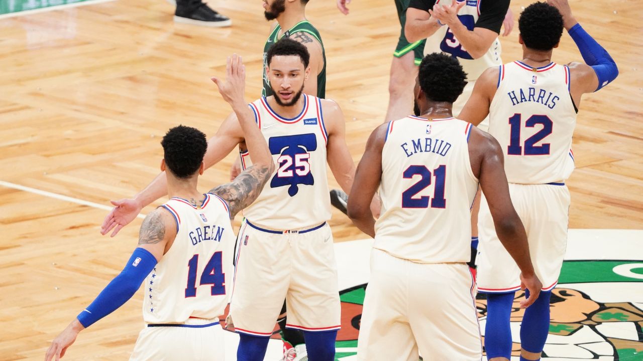Philadelphia 76ers guard Ben Simmons (25) congratulates forward Danny Green (14) after his three point basket against the Boston Celtics in the second quarter at TD Garden.