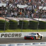 NASCAR Cup Series driver Chase Briscoe (19) celebrates after winning The Great American Getaway 400 at Pocono Raceway.