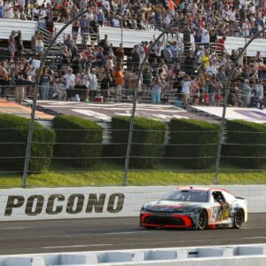 NASCAR Cup Series driver Chase Briscoe (19) celebrates after winning The Great American Getaway 400 at Pocono Raceway.