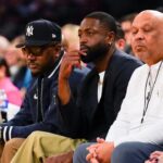 Former NBA player Dwayne Wade watches the NCAA Big East Conference Tournament quarterfinals game between the Xavier Musketeers and Marquette Golden Eagles, Thursday, March 13, 2025, at Madison Square Garden in New York City.