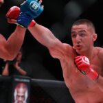 Aaron Pico (red gloves) and Henry Corrales (blue gloves) during Bellator 214 at The Forum.