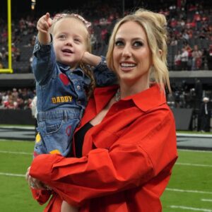 Brittany Mahomes, the wife of Kansas City Chiefs quarterback Patrick Mahomes (15) holds daughter Sterling Mahomes during the game against the Las Vegas Raiders at Allegiant Stadium.