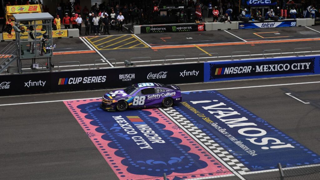 Trackhouse Racing driver Shane van Gisbergen crosses the finish line to win the NASCAR Cup Series Mexico City Race at Autodromo Hermanos Rodriguez.