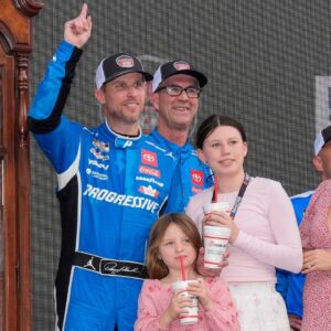 NASCAR Cup Series driver Denny Hamlin (11) and his family celebrate his win at the Cook Out 400 at Martinsville Speedway.
