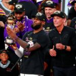Los Angeles Lakers forward LeBron James (23) holds up the MVP trophy after game six of the 2020 NBA Finals at AdventHealth Arena. The Los Angeles Lakers won 106-93 to win the series.
