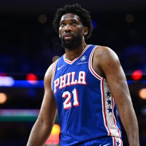 Feb 4, 2025; Philadelphia, Pennsylvania, USA; Philadelphia 76ers center Joel Embiid (21) looks on against the Dallas Mavericks in the third quarter at Wells Fargo Center.