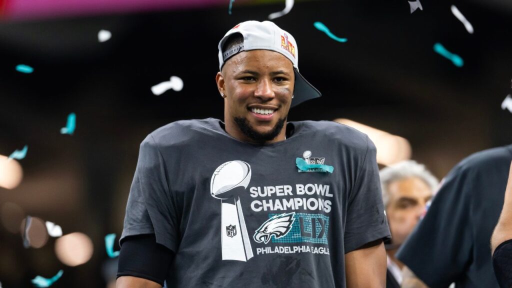 Philadelphia Eagles running back Saquon Barkley (26) celebrates after defeating the Kansas City Chiefs during Super Bowl LIX at Ceasars Superdome.