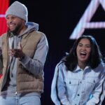 Golden State Warriors players Stephen Curry and wife Ayesha Curry react on stage during the 2022 NBA All-Star Saturday Night at Rocket Mortgage Field House.