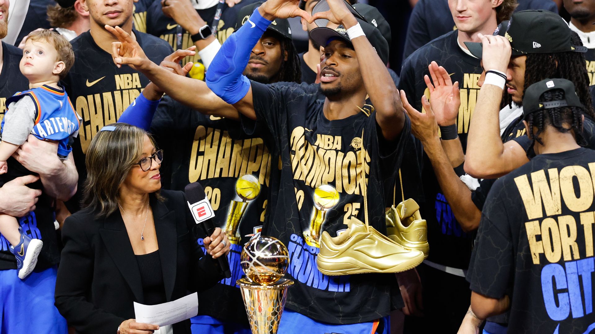 Jun 22, 2025; Oklahoma City, Oklahoma, USA; Oklahoma City Thunder guard Shai Gilgeous-Alexander (2) makes a heart gesture as the Oklahoma City Thunder celebrate after winning game seven of the 2025 NBA Finals against the Indiana Pacers at Paycom Center