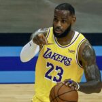 Los Angeles Lakers forward LeBron James (23) dribbles the ball against the Houston Rockets during the second quarter at Toyota Center