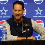 Dallas Cowboys head coach Brian Schottenheimer addresses the media before practice at the Ford Center at the Star Training Facility in Frisco, Texas.