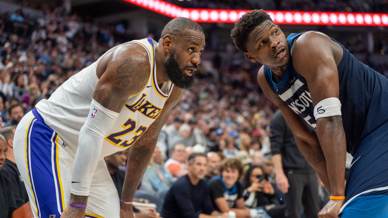 Minnesota Timberwolves guard Anthony Edwards (5) guards Los Angeles Lakers forward LeBron James (23)
