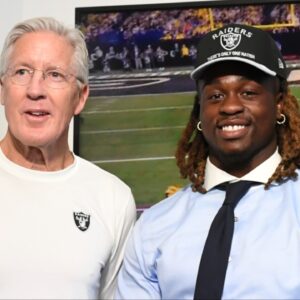 Las Vegas Raiders head coach Pete Carroll, Ashton Jeanty and general manager John Spytek pose after a news conference introducing Jeanty as the first round draft pick in the 2025 NFL Draft at Intermountain Health Performance Center.