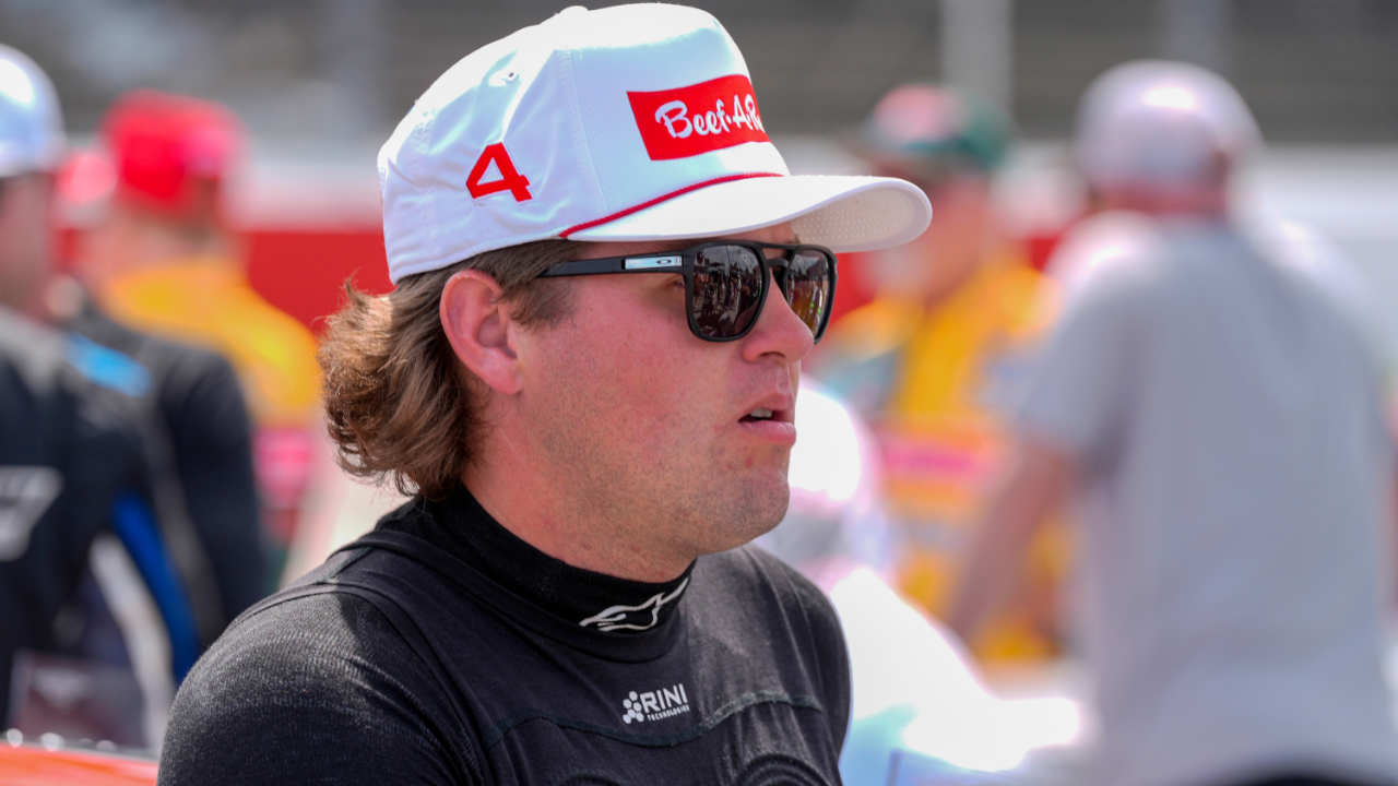Apr 6, 2025; Darlington, South Carolina, USA; NASCAR Cup Series driver Noah Gragson (4) pre race during the Goodyear 400 at Darlington Raceway. Mandatory Credit: Jim Dedmon-Imagn Images