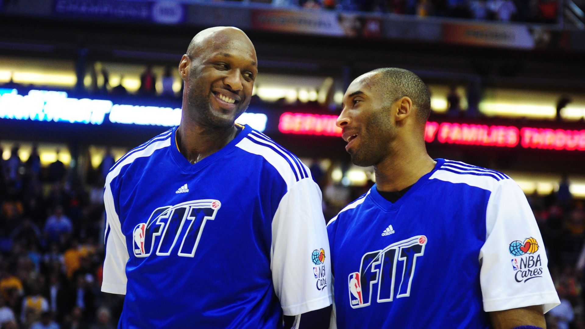 Jan. 5, 2011; Phoenix, AZ, USA; Los Angeles Lakers forward Lamar Odom (left) talks with guard Kobe Bryant against the Phoenix Suns at the US Airways Center. The Lakers defeated the Suns 99-95.