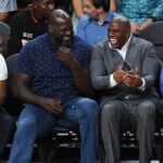 NBA Hall of Famers Shaquille O'Neal and Magic Johnson share a laugh during the second half between the Los Angeles Lakers and the Golden State Warriors at T-Mobile Arena.