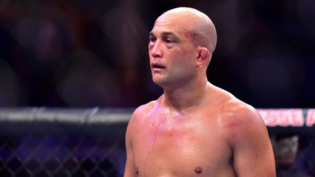 BJ Penn (red gloves) reacts to fight against Clay Guida (blue gloves) during UFC 237 at Jeunesse Arena.