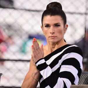 Former professional racing driver Danica Patrick looks on before the 109th Running of the Indianapolis 500 at Indianapolis Motor Speedway.